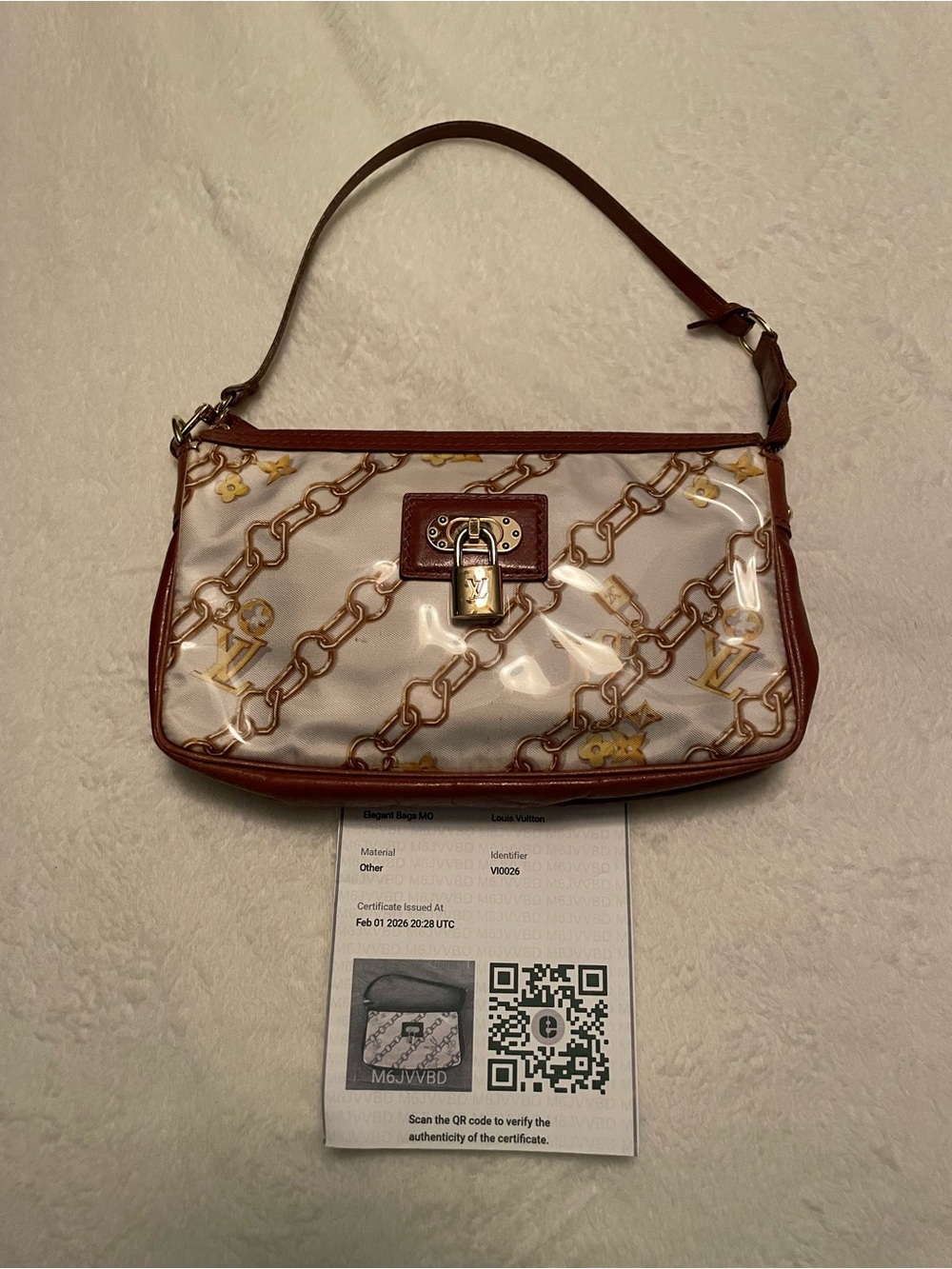 Louis Vuitton White Shoulder Bag with Brown Trim and Gold Chain Motif